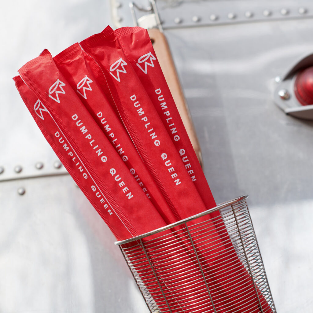 Hospitality brand Dumpling Queen, airstream dumpling kitchen, custom chopsticks
