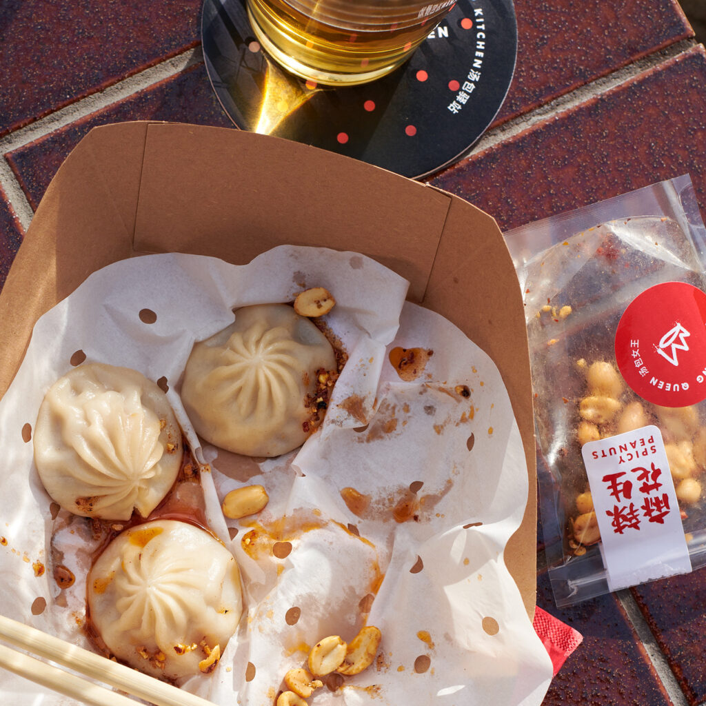 Hospitality branding Dumpling Queen spicy peanuts custom label packaging and drinks coaster design